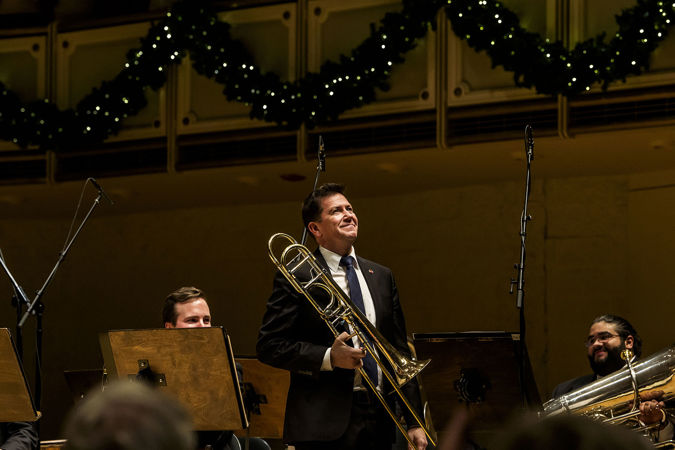 CSO principal trombone Timothy Higgins takes a bow with his instrument