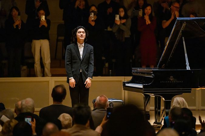 Yunchan Lim takes his final bow as the audience rises to its feet