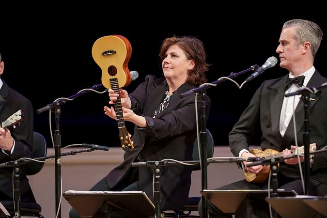 Leisa Rea does a 360 spin of her ukulele in the middle of a song