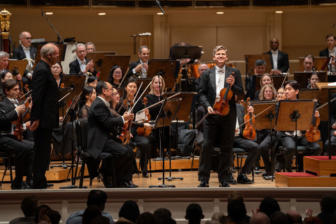 Closeup bow shot of guest violinist James Ehnes