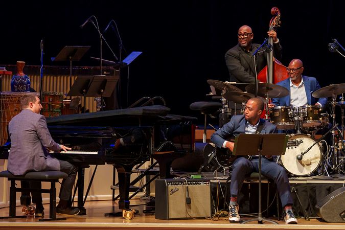 pianist Benny Green, guitarist Dan Wilson, bassist Christian McBride, and drummer Lewis Nash perform a quartet by Oscar Peterson