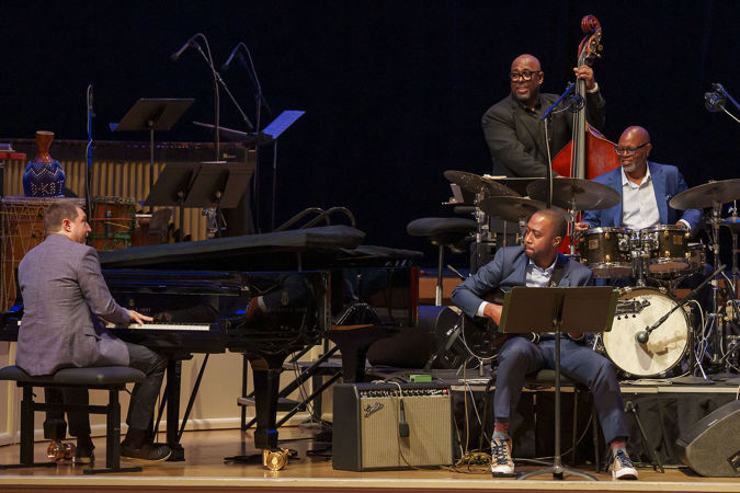 pianist Benny Green, guitarist Dan Wilson, bassist Christian McBride, and drummer Lewis Nash perform a quartet by Oscar Peterson