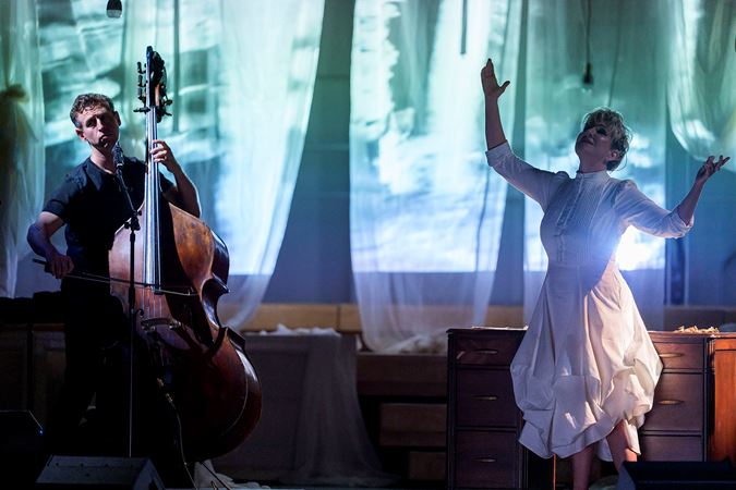 Bassist Ranaan Meyer and mezzo-soprano Joyce DiDonato are shrouded in magical blue and green backlighting