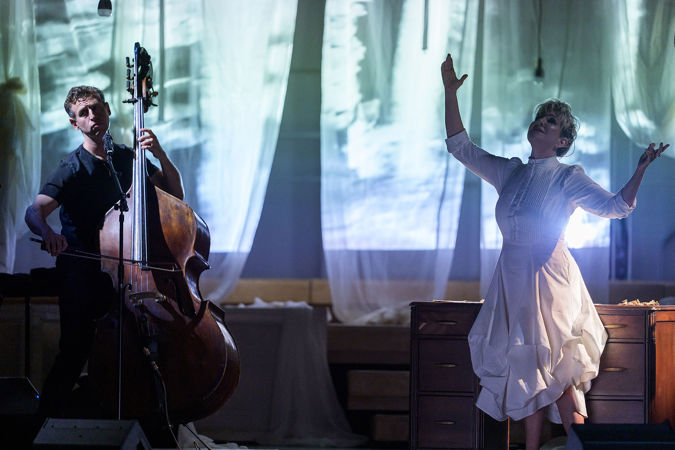 Bassist Ranaan Meyer and mezzo-soprano Joyce DiDonato are shrouded in magical blue and green backlighting