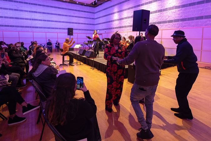 dancers and band on stage