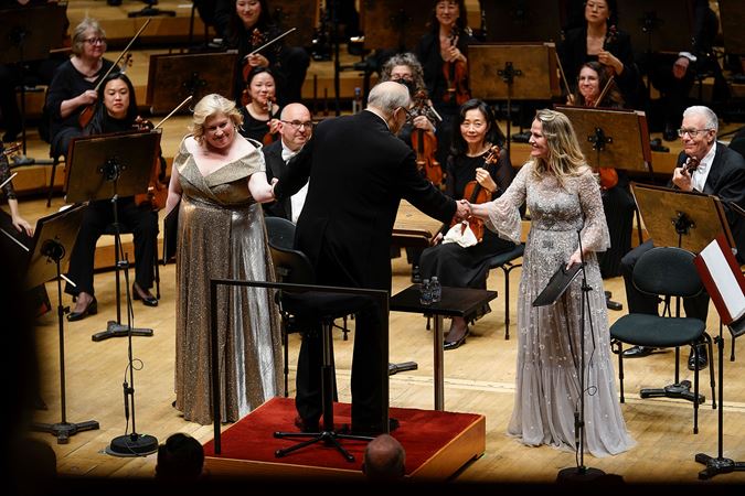 conductor shaking hands of soloists