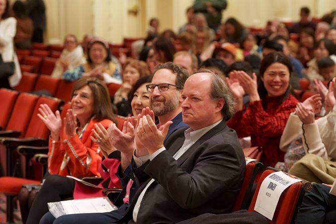2025 Young Artists Competition judges applauding the finalists on the Main Floor