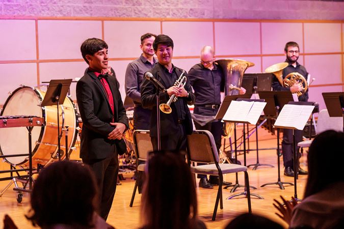 composer standing for applause