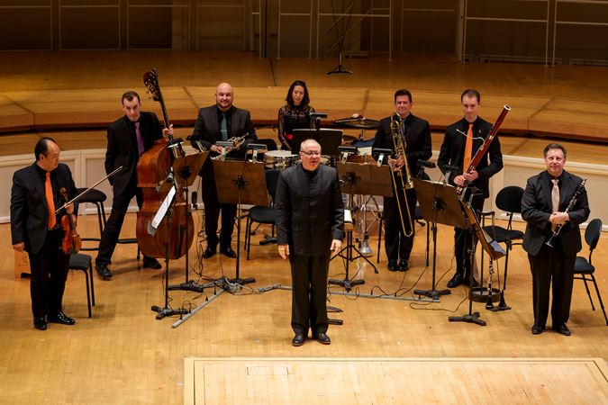 Bow shot of guest conductor Stefan Asbury and CSO musicians