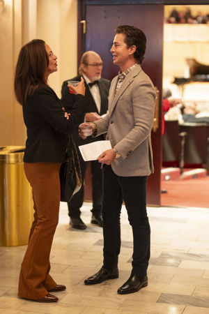 Two patrons talking in the Main Floor lobby