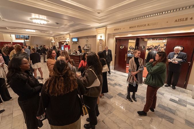 patrons mingling in the lobby