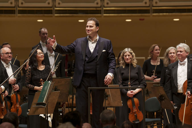 Conductor acknowledging audience