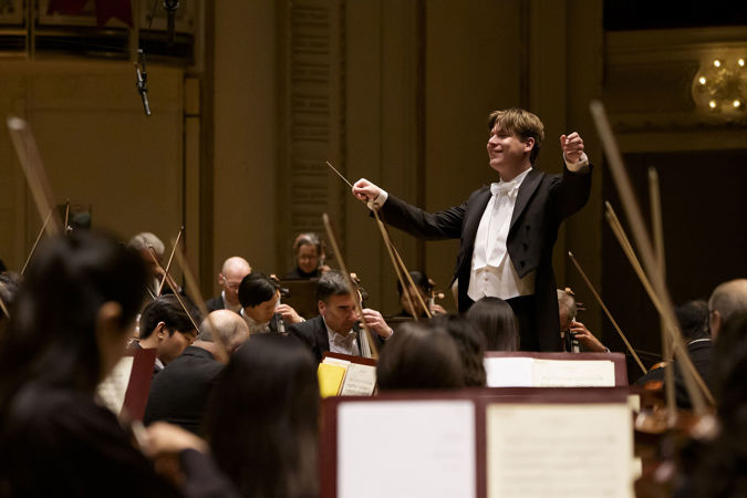 Klaus Mäkelä conducts the CSO with a big smile
