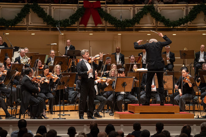 Action shot of the CSO, guest violinist James Ehnes and conductor Gianandrea Noseda