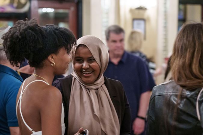 audience members in lobby