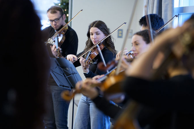 Closeup of Civic violin Lina Yamin performing during the 2025 Civic Bach Marathon