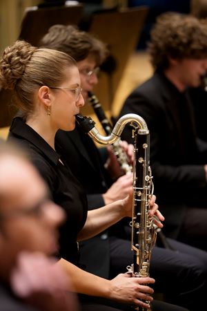 Closeup of a Civic musician warming up