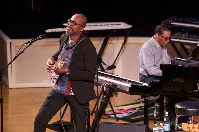 guitarist Lionel Loueke closes his eyes as he connects with a groove