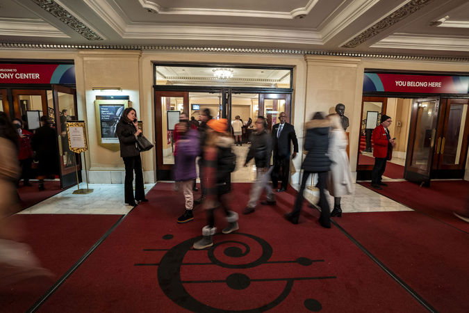 Patrons scanning tickets in Michigan Avenue lobby