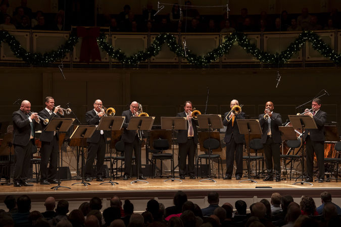 a brass octet performs