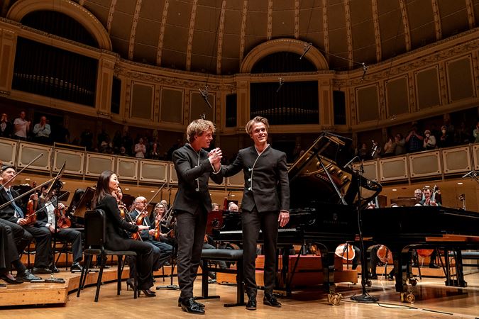 soloists acknowledging audience