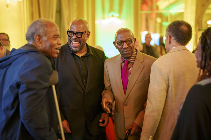 Christian McBride greets members of the CSO African American Network at the postconcert reception