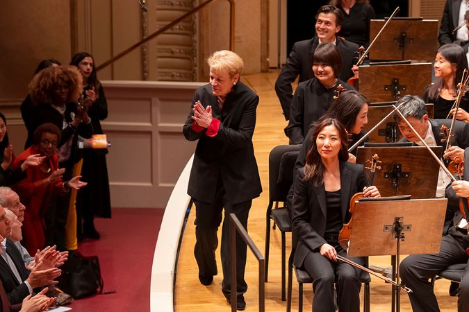 conductor thanking audience